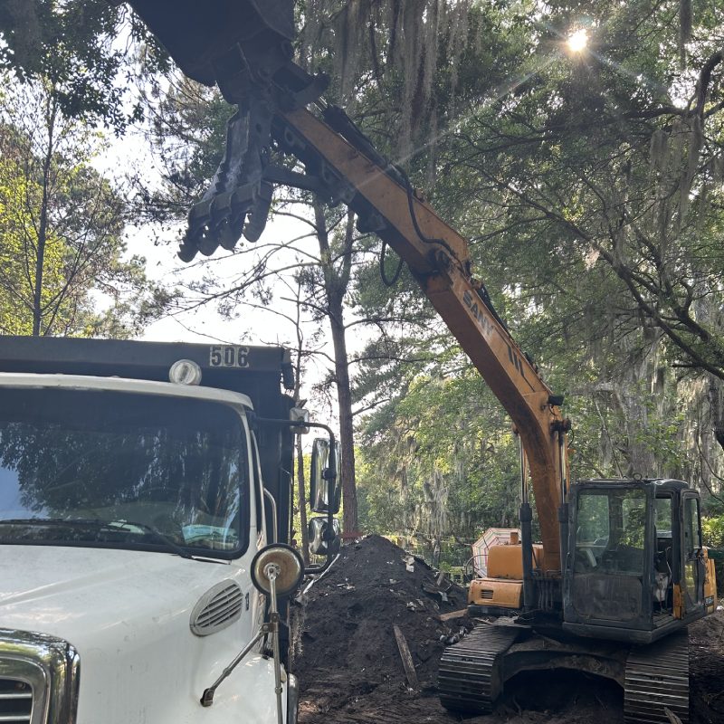 man in protective helmet turning head towards camera